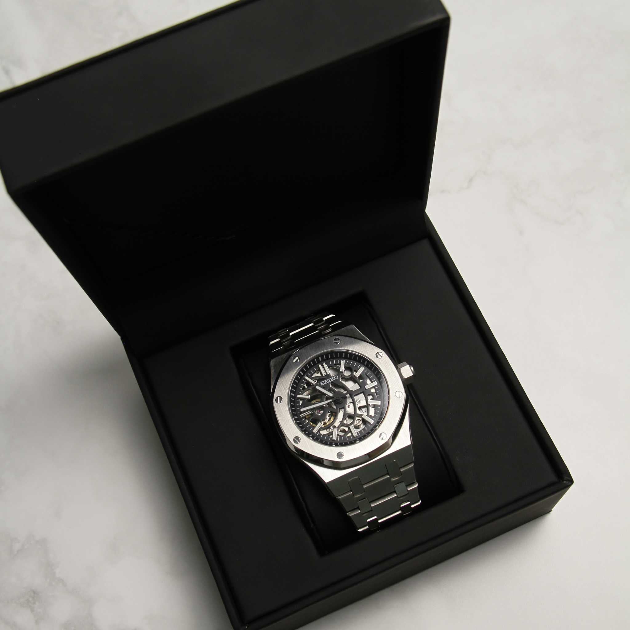 Montre Seiko mod Royal oak squelette dans son écrin Modus Seiko