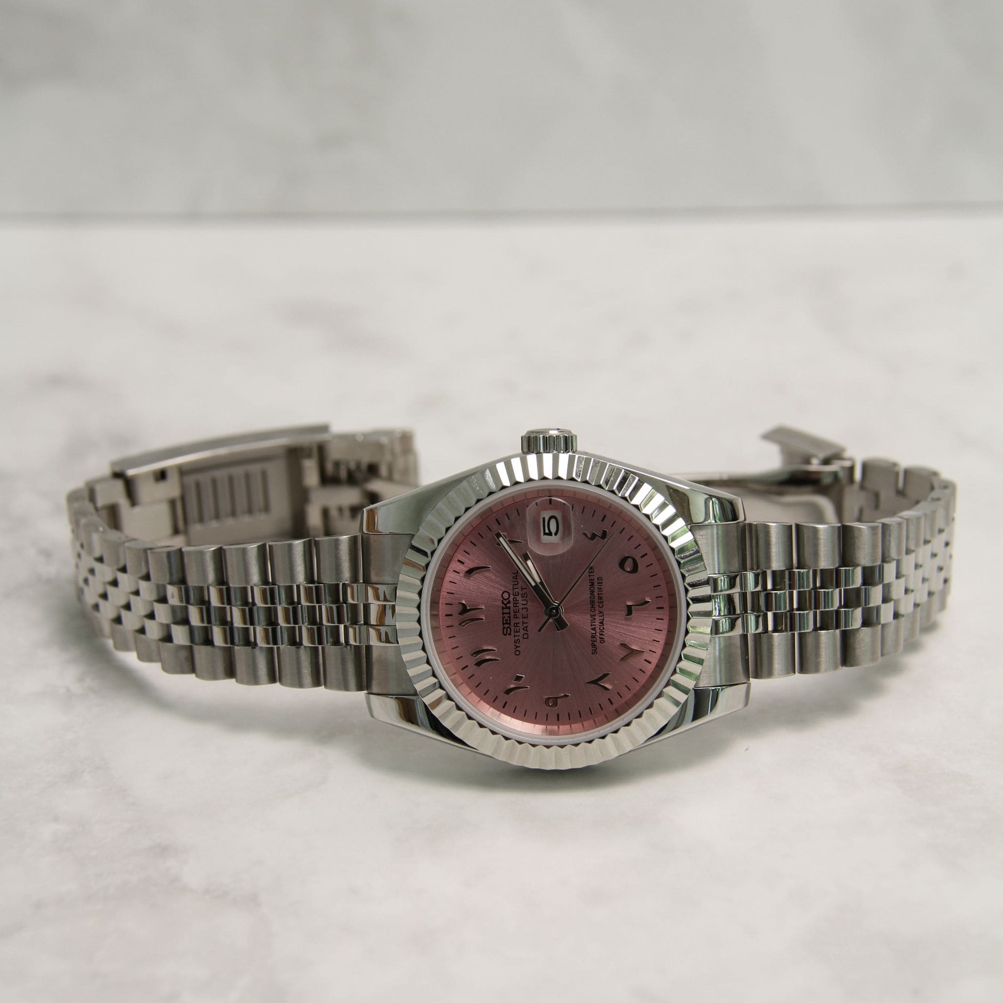 Montre Seiko Mod Datejust rose avec bracelet – mouvement automatique visible NH35