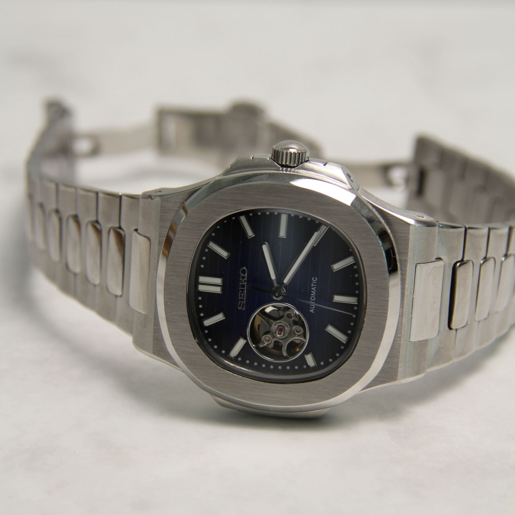 Montre Seiko Mod nautilus bleu squelette cœur ouvert avec bracelet - mouvement automatique visible NH35